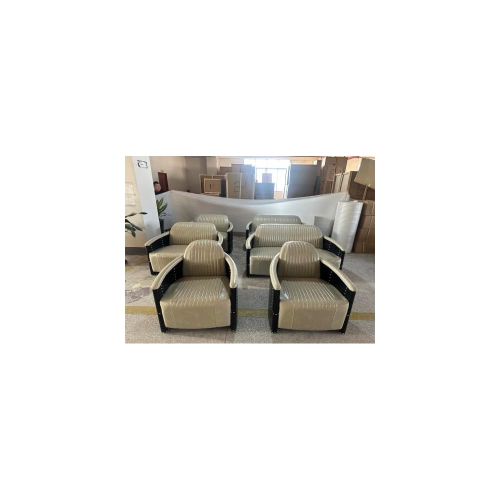 Beige Leather Accent Chair with Channel Tufting and Black Riveted Sides