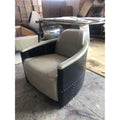 Beige Leather Accent Chair with Channel Tufting and Black Riveted Sides